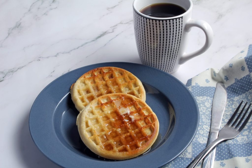 waffles,with,butter,and,syrup,,and,coffee,for,breakfast.,copy